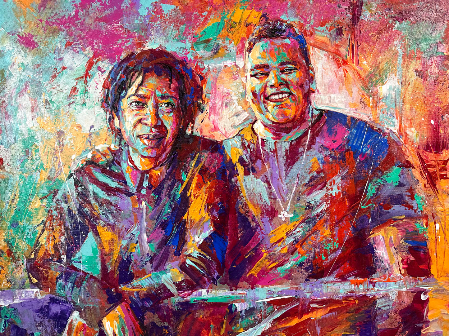 Colorful abstract painting of two people sitting together Djavan and Duzão